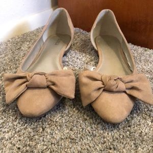 Tan flats with cute top bow.